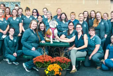 a group of people posing for a photo